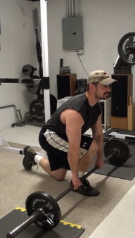 Bar-in Front Split Squats for lthe lower glutes and upper hamstrings