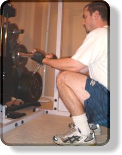 squatting-cable-curls-middle.jpg