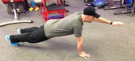 Pushup with One Arm Extended (aka Superman Pushup)