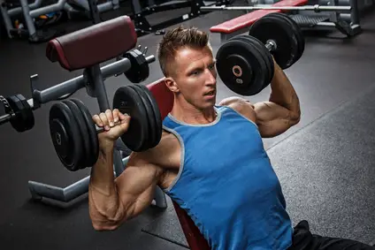 Shrugging the Shoulders During Shoulder Presses