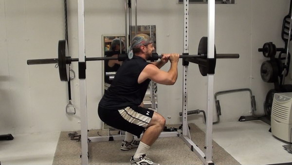 Build Rock-Solid Core Strength and Stability and Hit Your Legs HARD at The Same Time With One-Shoulder Barbell Squats