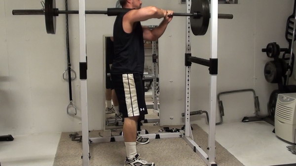 Build Rock-Solid Core Strength and Stability and Hit Your Legs HARD at The Same Time With One-Shoulder Barbell Squats