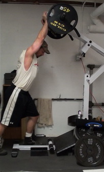 How to do the Shoulder Press on the Standing Calf Raise Machine