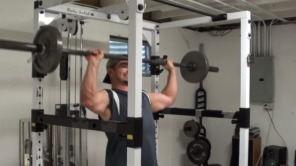 Barbell Shoulder Press - bar clearing face