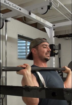 Barbell Shoulder Press - elbows flared in front at bottom