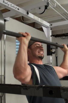 Barbell Shoulder Press - bar clearing face