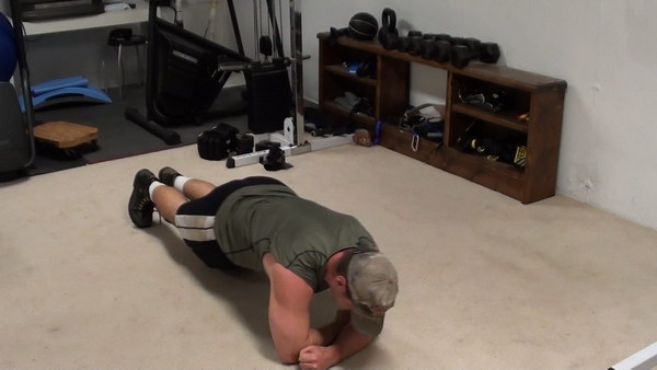 One-Arm Hammer Planks... A Bodyweight Exercise for Developing Extreme Core Strength and Stability