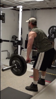 In-Set Superset for your back, alternating reps of Bent-Over Barbell Rows and Deadlifts