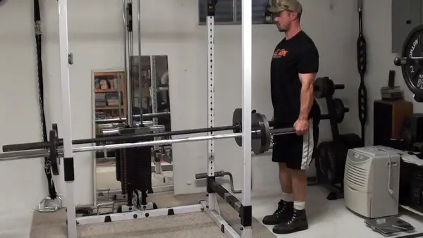 Two-Barbell Stiff-Legged Deadlifts for feeling your hamstrings working better - top position