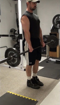 Bar-in Front Split Squats for lthe lower glutes and upper hamstrings