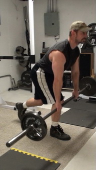 Bar-in Front Split Squats for lthe lower glutes and upper hamstrings