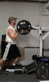 How to do the Shoulder Press on the Standing Calf Raise Machine