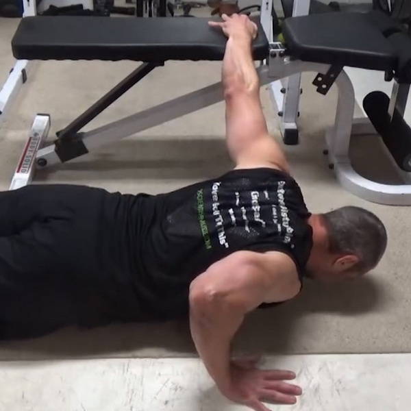 Outrigger One-Arm Bench Push-Ups