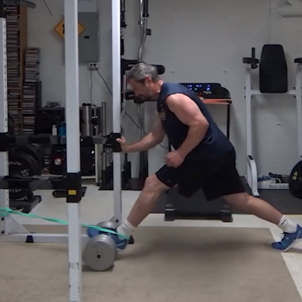Banded Rolling Dumbbell Adductor/Hamstring Lunges